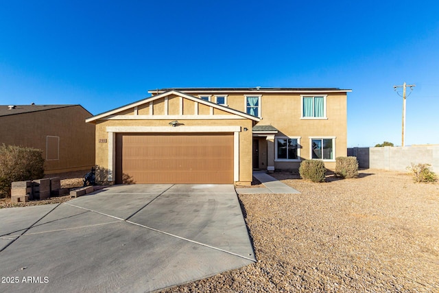 view of front of property with a garage