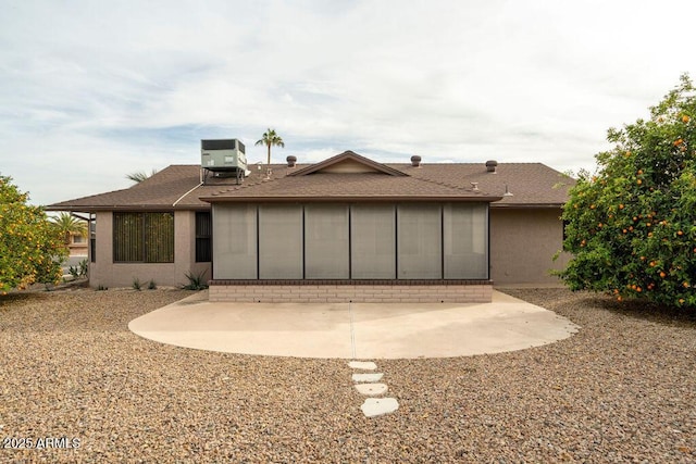 back of house featuring cooling unit and a patio area