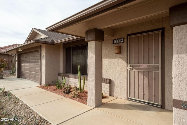 property entrance with a garage