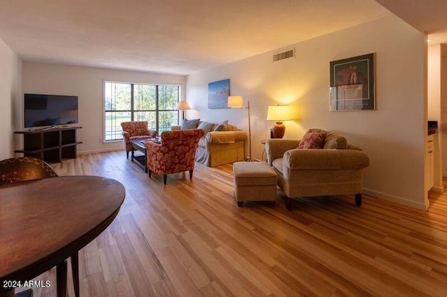 living room featuring light wood-type flooring