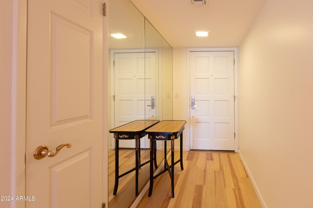 hall featuring light hardwood / wood-style flooring