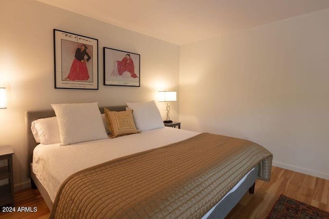 bedroom featuring hardwood / wood-style floors