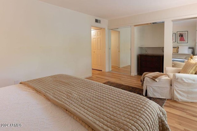 bedroom featuring hardwood / wood-style flooring