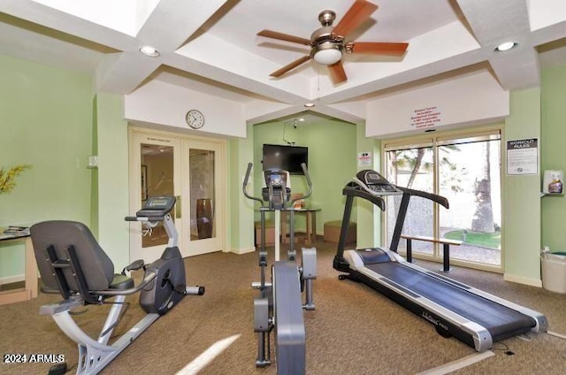 exercise room with french doors, carpet flooring, coffered ceiling, and ceiling fan