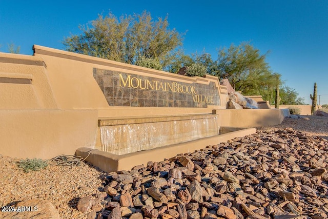 view of community sign