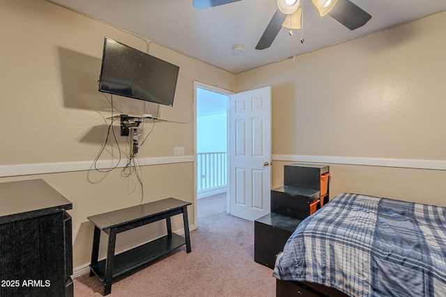 carpeted bedroom featuring a ceiling fan