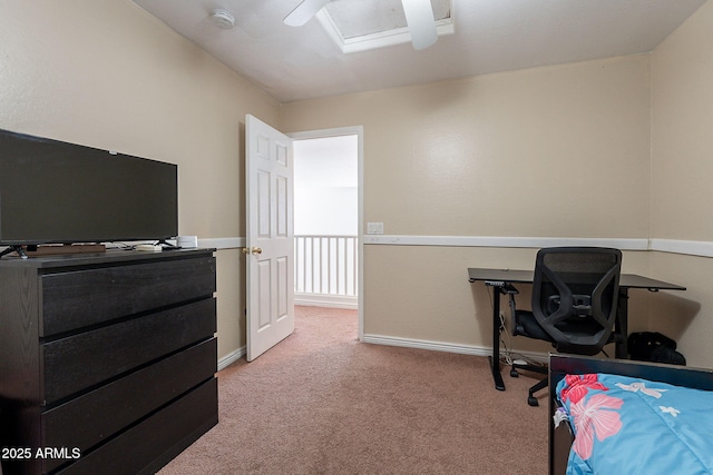 carpeted bedroom featuring baseboards and a ceiling fan