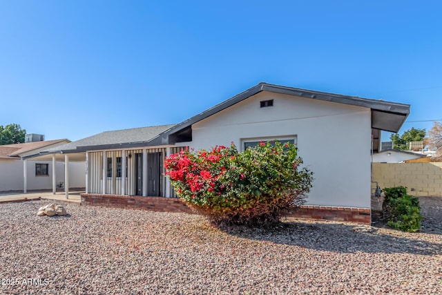 back of property with a patio area