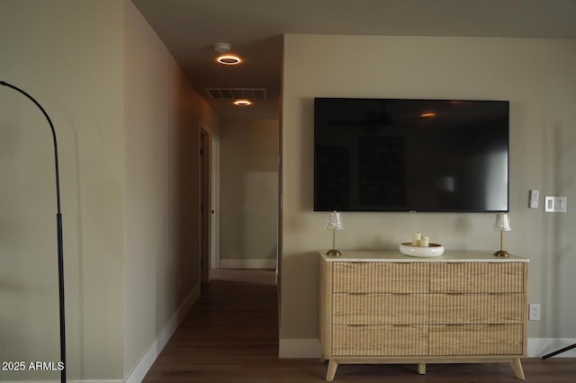 hallway with dark wood-type flooring