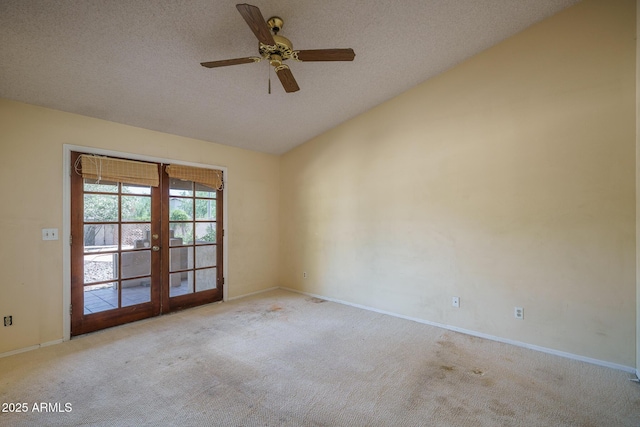 6101 E Beck Ln, Scottsdale, AZ 85254 - empty room featuring lofted ceiling, french doors, carpet flooring, a textured ceiling, and a ceiling fan