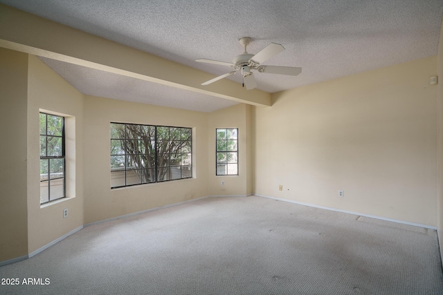 6101 E Beck Ln, Scottsdale, AZ 85254 - carpeted empty room with ceiling fan, a textured ceiling, and beam ceiling