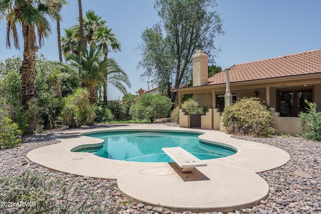 6101 E Beck Ln, Scottsdale, AZ 85254 - outdoor pool with a diving board and a patio