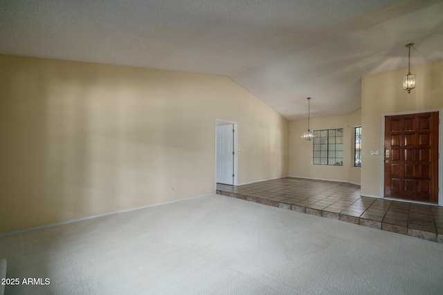 6101 E Beck Ln, Scottsdale, AZ 85254 - foyer entrance featuring a chandelier, carpet flooring, and vaulted ceiling