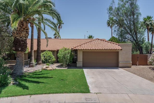 6101 E Beck Ln, Scottsdale, AZ 85254 - view of front of home with a tile roof, stucco siding, driveway, an attached garage, and a front lawn