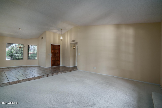 6101 E Beck Ln, Scottsdale, AZ 85254 - carpeted spare room with a chandelier and lofted ceiling
