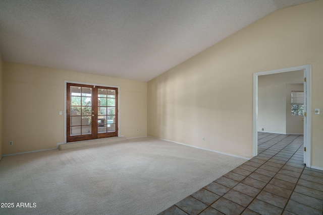 6101 E Beck Ln, Scottsdale, AZ 85254 - spare room with lofted ceiling, french doors, and carpet