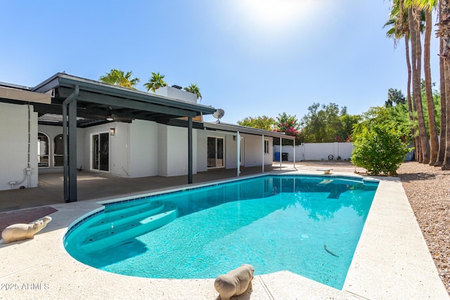 view of pool featuring a patio area