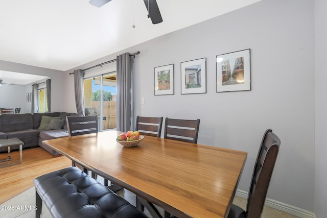 dining room featuring hardwood / wood-style flooring and ceiling fan