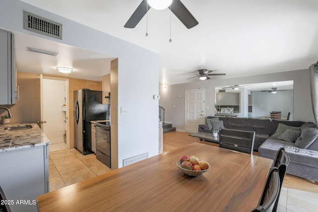 tiled dining space with sink