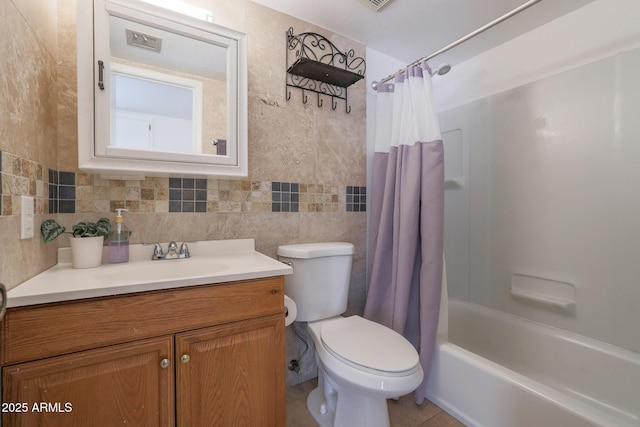 full bathroom with tile patterned floors, vanity, toilet, and shower / bathtub combination with curtain