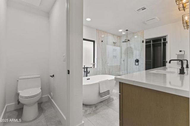 full bathroom featuring vanity, toilet, independent shower and bath, and tile patterned flooring