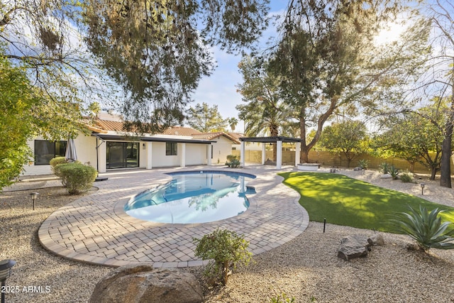 view of swimming pool featuring a gazebo, a yard, and a patio area