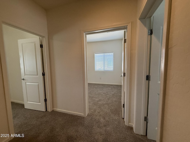 1725 W Pollack St, Phoenix, AZ 85041 - hallway with carpet and baseboards