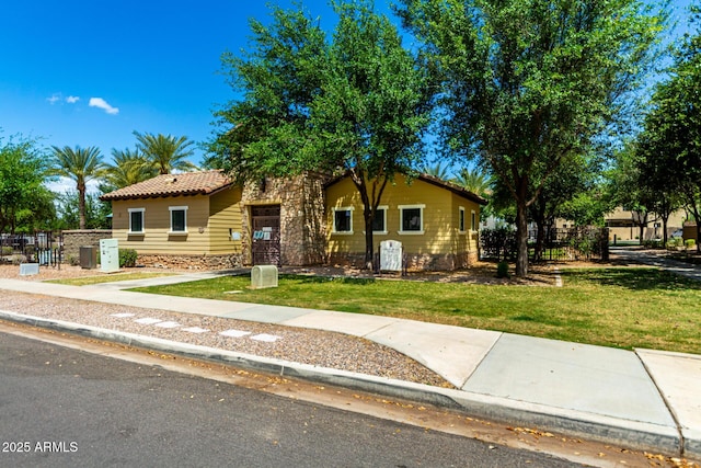 4495 E Woodside Way, Gilbert, AZ 85297 - view of front of property with fence, a tile roof, and a front yard