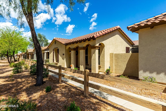 4495 E Woodside Way, Gilbert, AZ 85297 - exterior space with a tile roof, fence private yard, and stucco siding