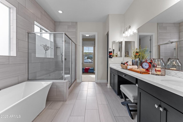 bathroom featuring plenty of natural light and a stall shower