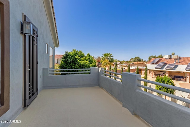 view of patio / terrace featuring a residential view and a balcony