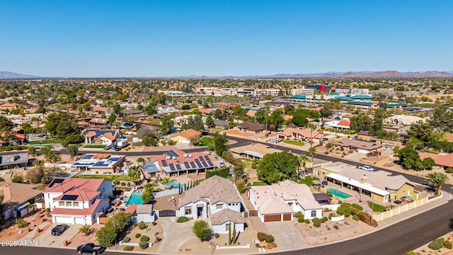 drone / aerial view featuring a mountain view and a residential view