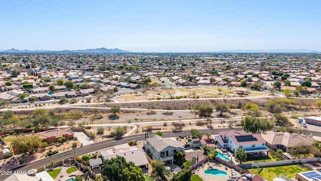 drone / aerial view with a residential view and a mountain view