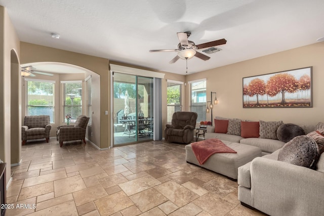 living room featuring ceiling fan