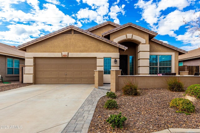 view of front of property with a garage