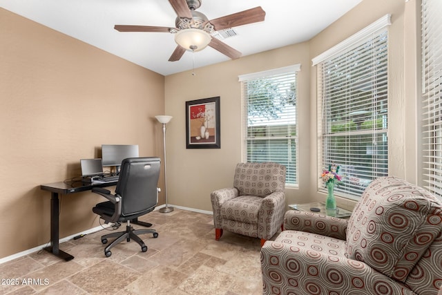 office space featuring ceiling fan