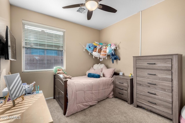 carpeted bedroom featuring ceiling fan