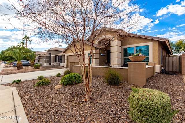 view of front of property with a garage