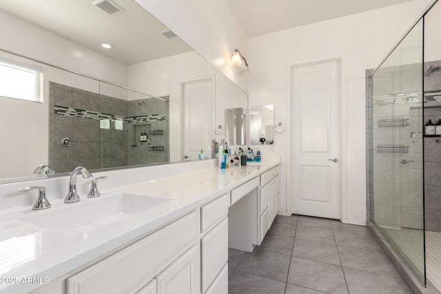 20496 W Valley View Dr, Buckeye, AZ 85396 - full bathroom featuring double vanity, a stall shower, and tile patterned floors