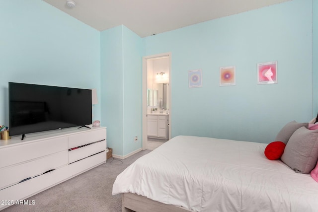 20496 W Valley View Dr, Buckeye, AZ 85396 - carpeted bedroom with ensuite bathroom and baseboards