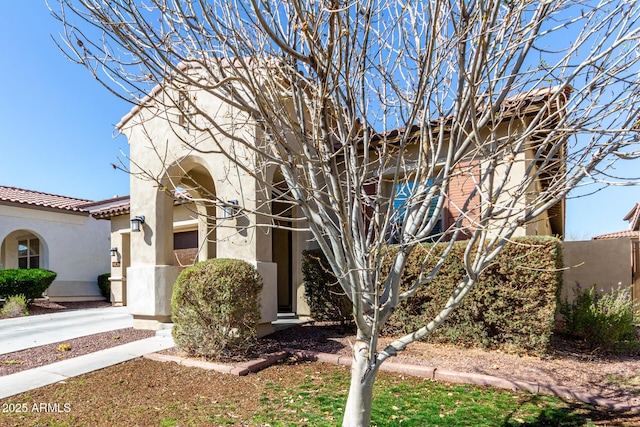 20496 W Valley View Dr, Buckeye, AZ 85396 - view of front of house featuring stucco siding and a tiled roof