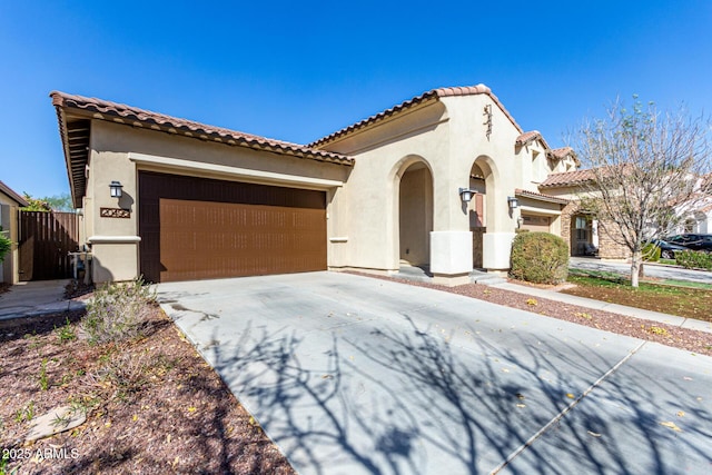 20496 W Valley View Dr, Buckeye, AZ 85396 - mediterranean / spanish home with stucco siding, an attached garage, driveway, and a tile roof