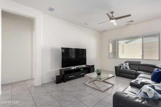 20496 W Valley View Dr, Buckeye, AZ 85396 - living area with light tile patterned flooring, ceiling fan, and baseboards
