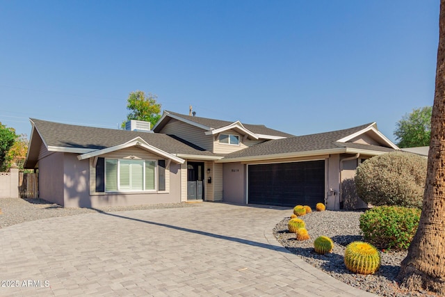 view of front of property featuring a garage