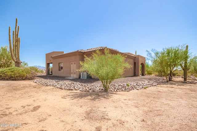 view of property exterior featuring central AC unit