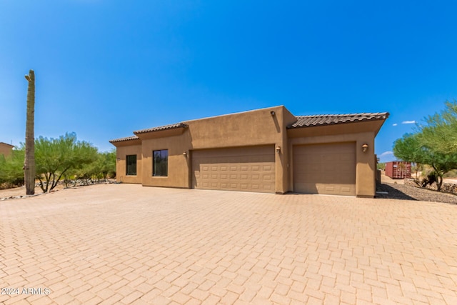 view of front of house with a garage