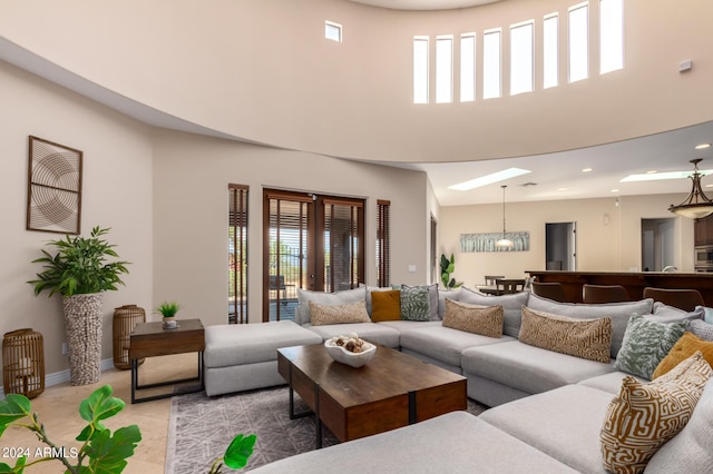 living room with a high ceiling