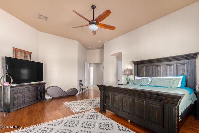 bedroom featuring wood-type flooring and ceiling fan