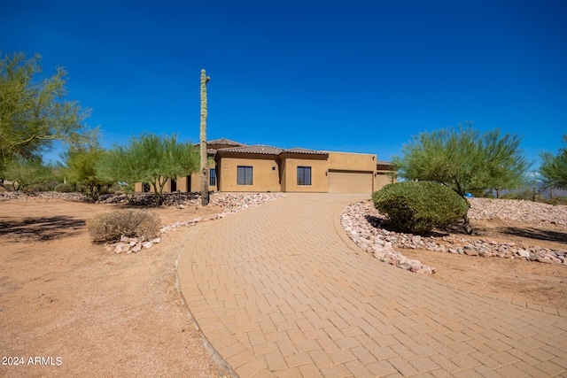 view of front of property featuring a garage