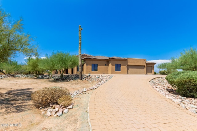 view of front of property featuring a garage